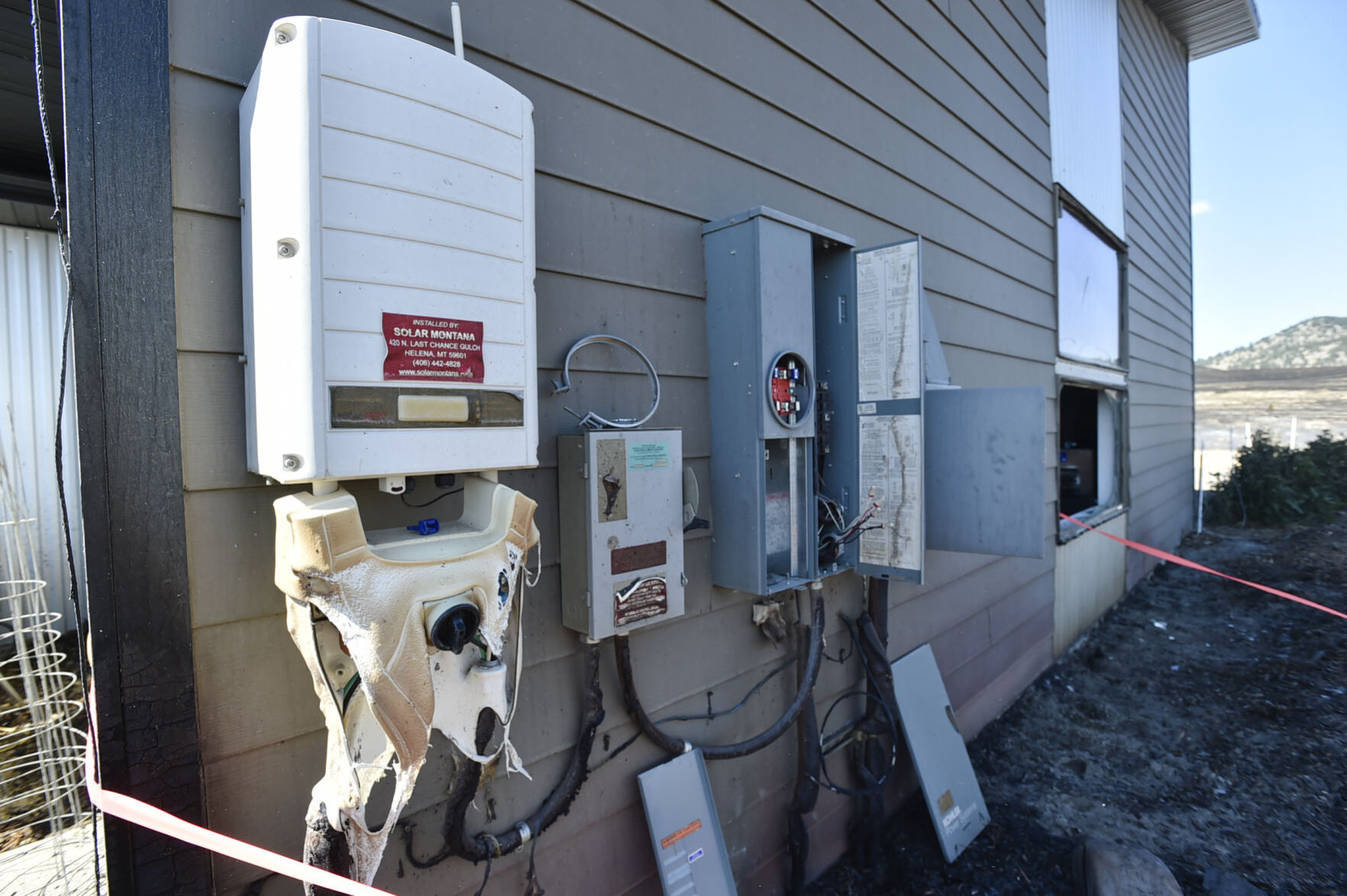 Utilities were damaged and a garage window was blown out